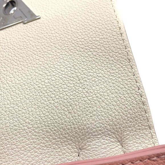 Louis Vuitton Lock Me Mini Leather Silver Hardware Backpack - Picture 5 of 13